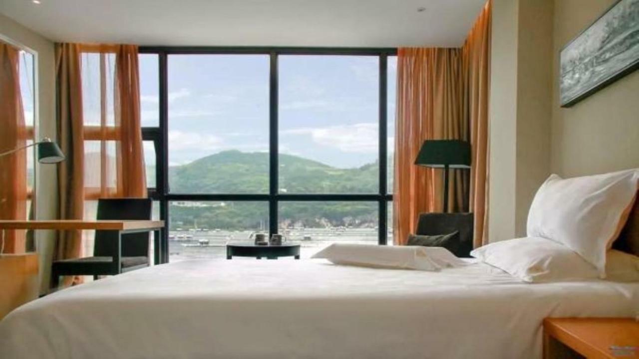 Friend Hui Hotel Чжанцзяцзе Экстерьер фото