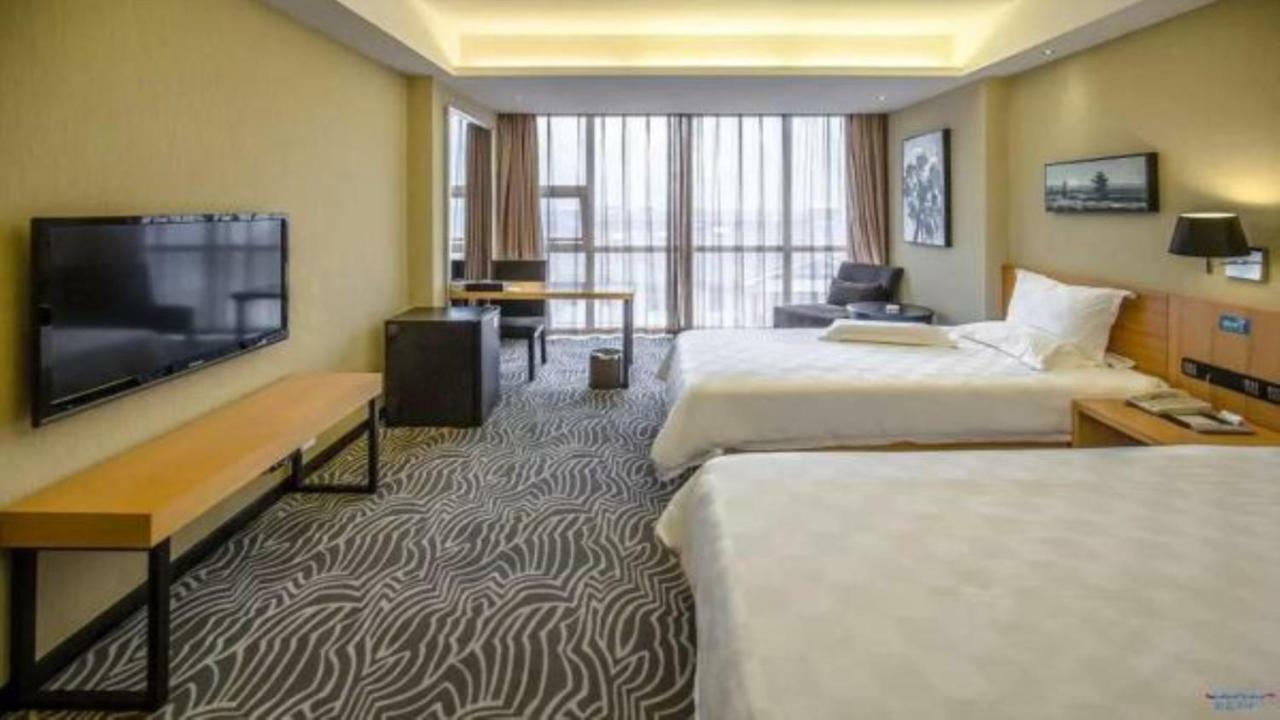 Friend Hui Hotel Чжанцзяцзе Экстерьер фото